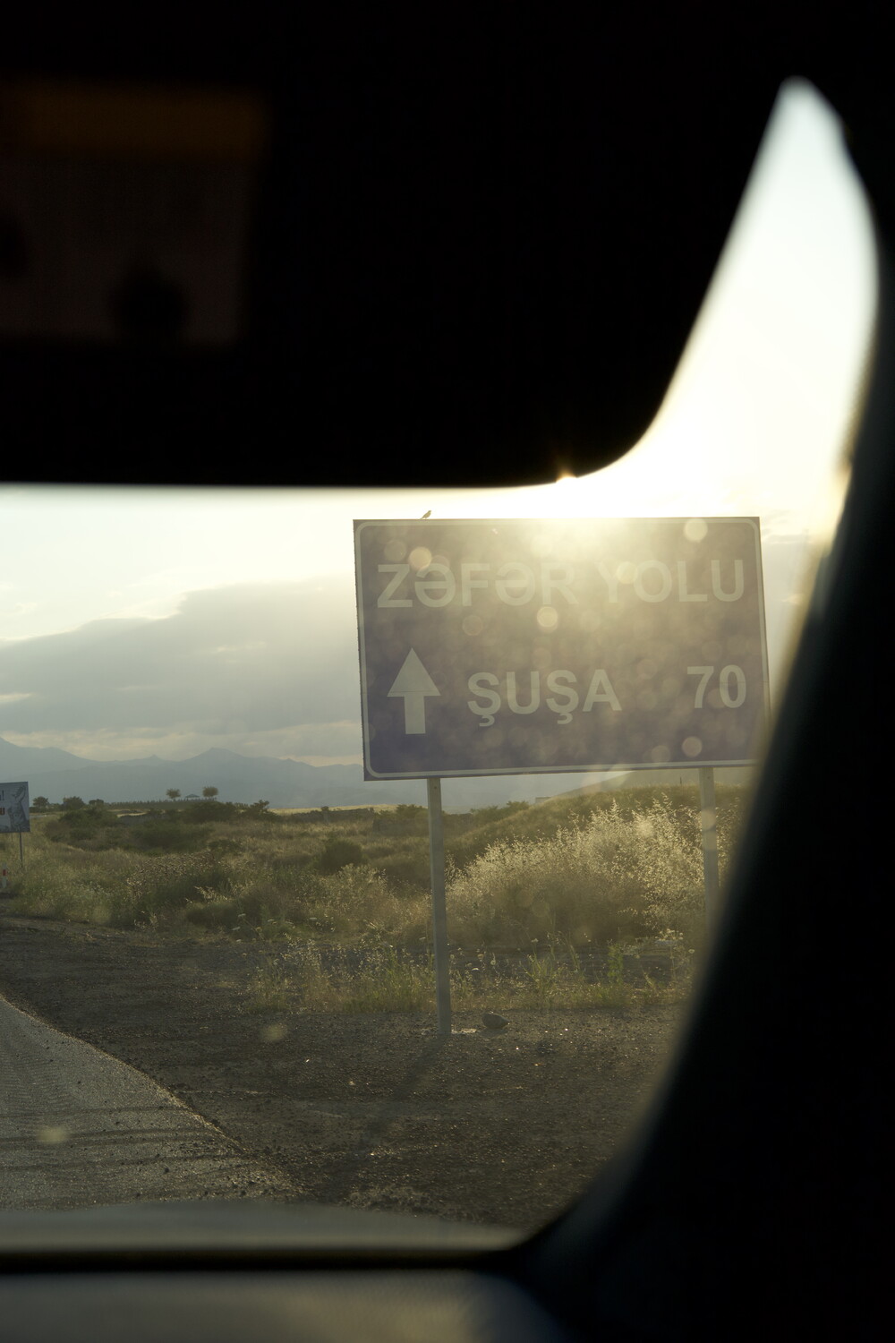 Road sign showing Shusha 79 km.