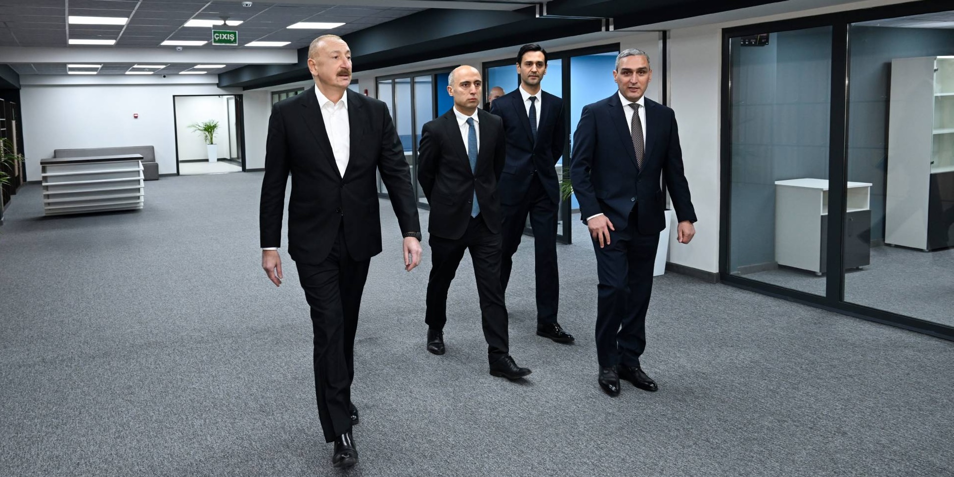 President and staff in the building